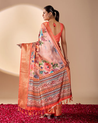 Soft Lichi Silk Saree adorned with elegant floral patterns and intricate Patola-inspired pallu, complemented by a luxurious zari woven border