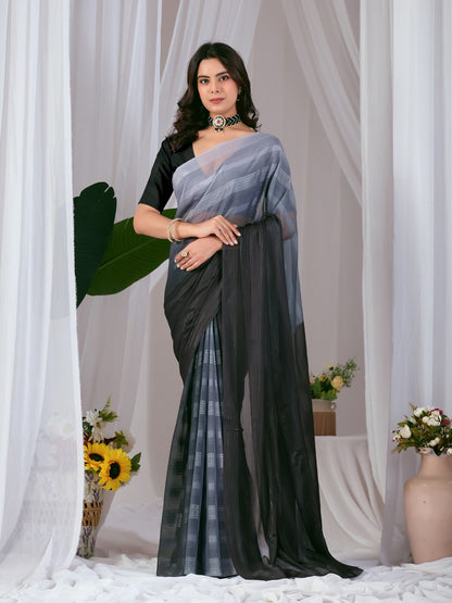Premium Monsoon Saree featuring a classy Silk blend of deep black and smoky grey tones with a silky smooth flow, designed to deliver a bold, elegant, and timeless look.
