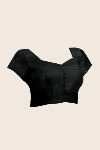 Premium Monsoon Saree featuring a classy Silk blend of deep black and smoky grey tones with a silky smooth flow, designed to deliver a bold, elegant, and timeless look.